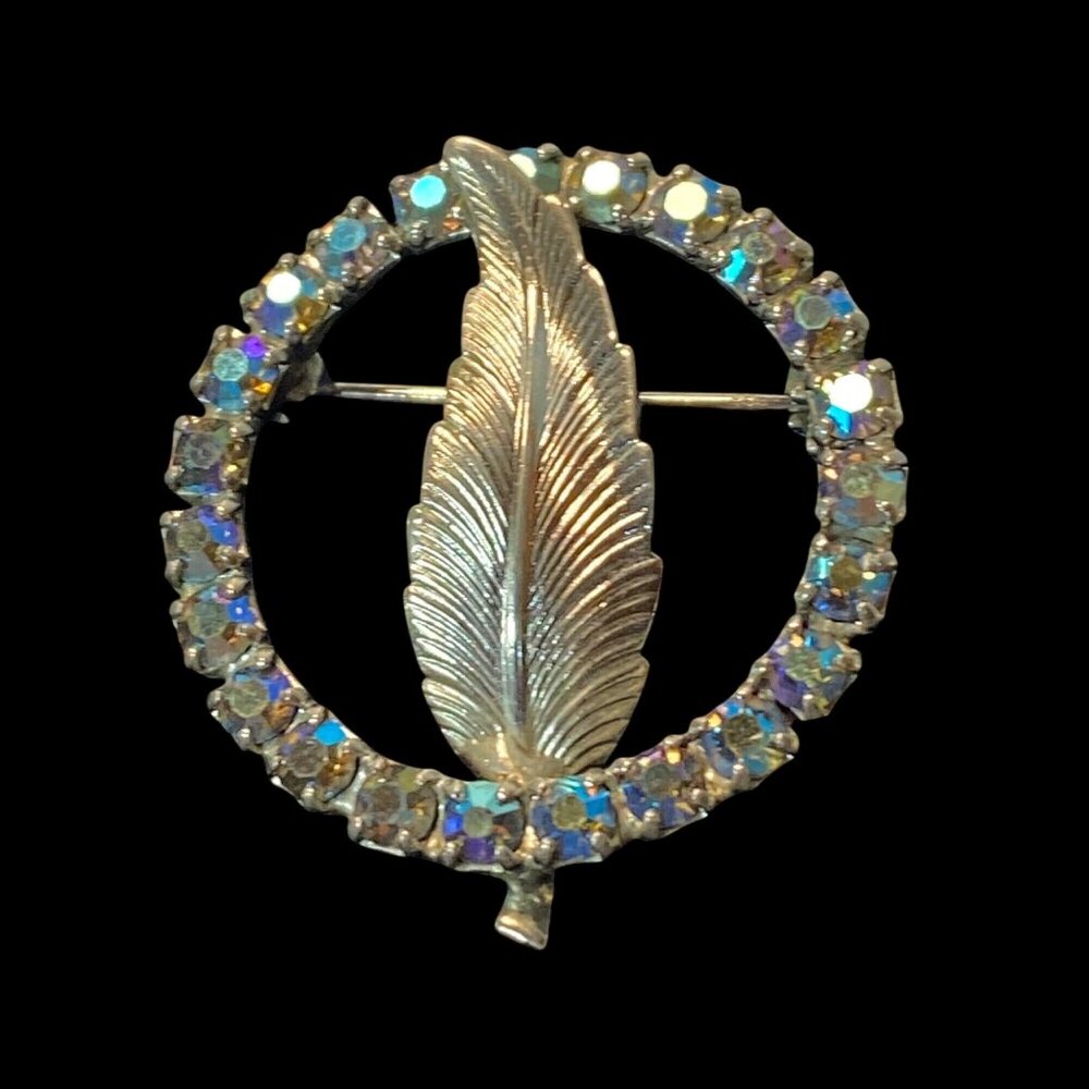 Vintage Aurora Borealis Rhinestone Circle Pin With Silver-Toned Feather Design